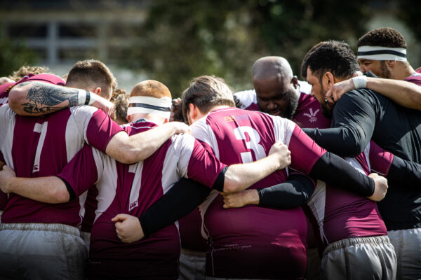 Men Huddle 1